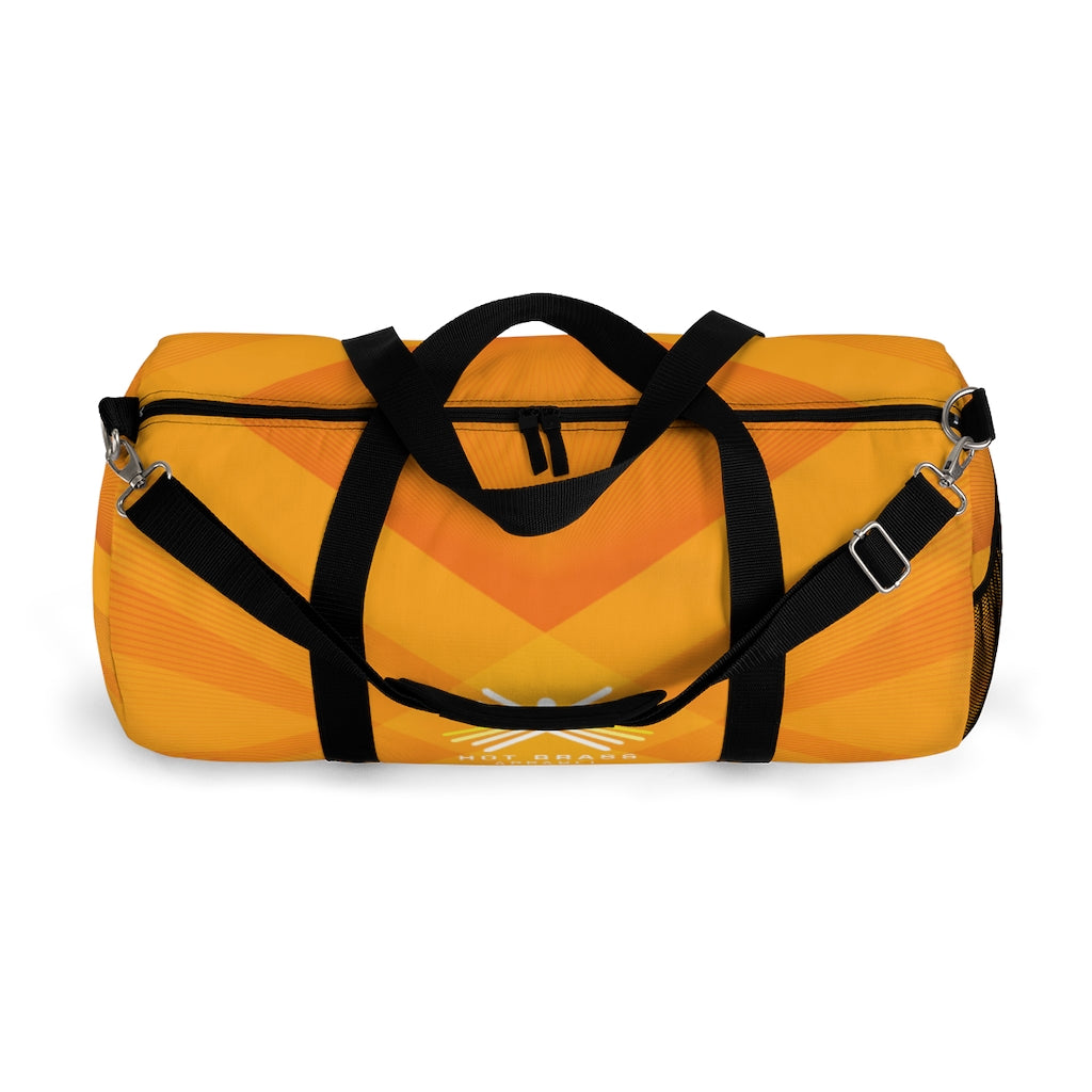 Hot Brass Graphic Duffel Bag – "Burn Bright"