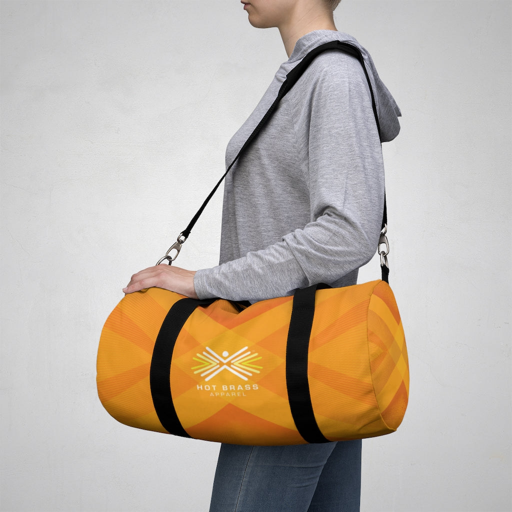 Hot Brass Graphic Duffel Bag – "Burn Bright"